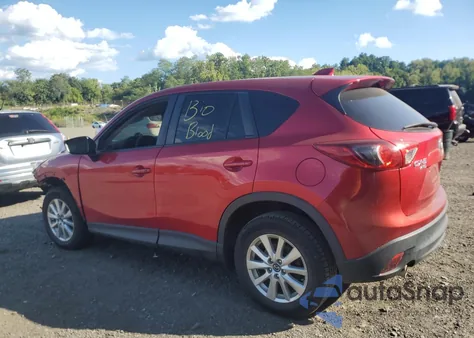 2014 Mazda Cx-5 Touring z USA, uszkodzony, nr VIN JM3KE4CYXE0364931